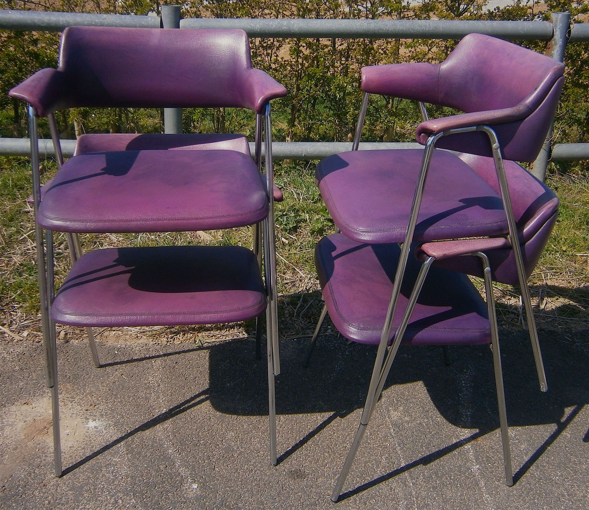 A set of four 1960s chrome framed Pel style elbow chairs